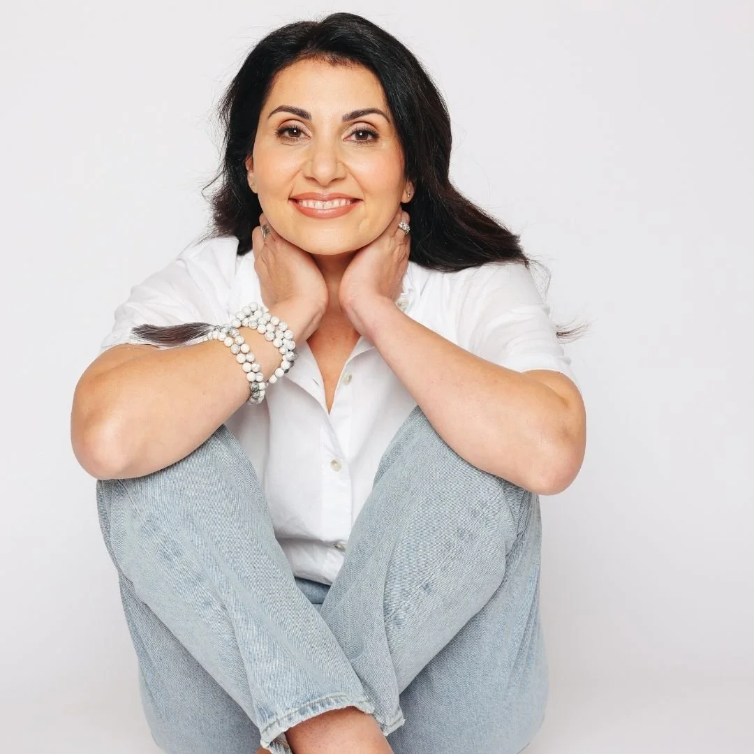 Maria Fabiano smiling, seated